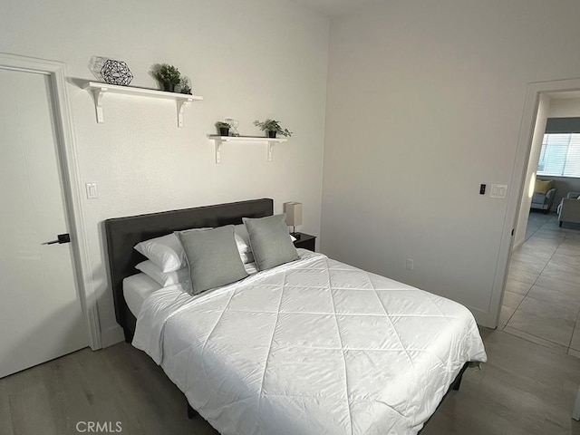 bedroom featuring hardwood / wood-style floors