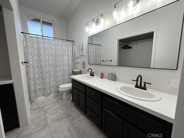 bathroom with vanity, a shower with curtain, and toilet