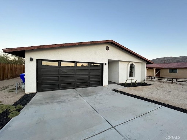 single story home featuring a garage