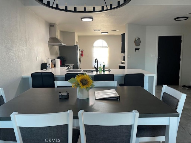 dining room featuring sink