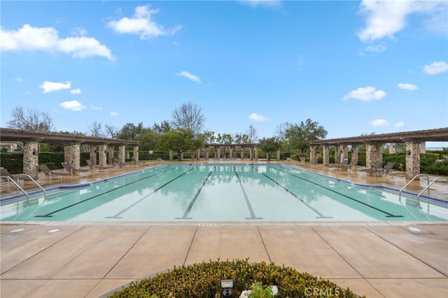 view of pool featuring a patio