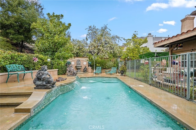 view of swimming pool featuring pool water feature