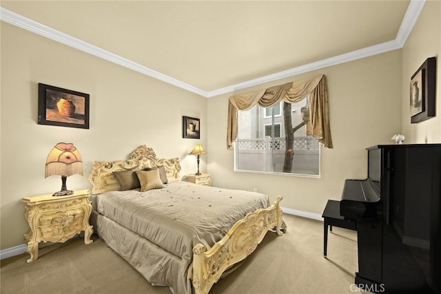 bedroom with ornamental molding and carpet