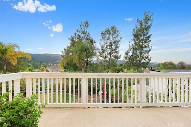 balcony featuring a mountain view