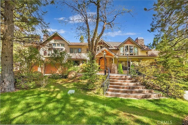 view of front facade with a front yard