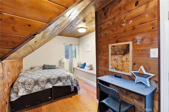 bedroom featuring wood ceiling, lofted ceiling, and wood-type flooring