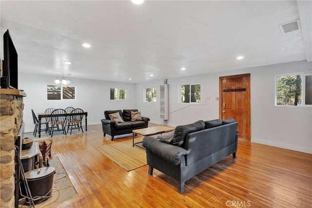 living room with light hardwood / wood-style flooring