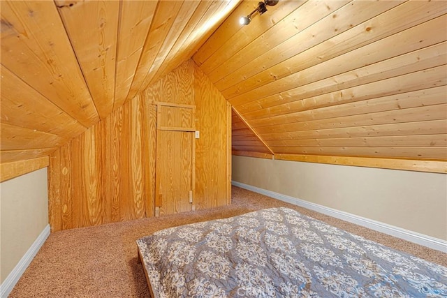 additional living space featuring vaulted ceiling, carpet floors, and wooden ceiling