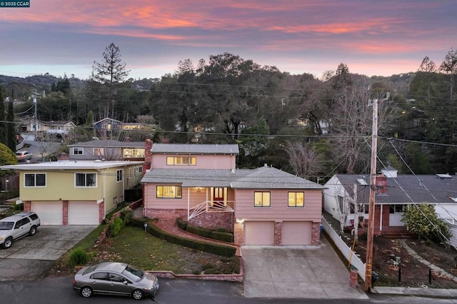 view of front of home with a garage