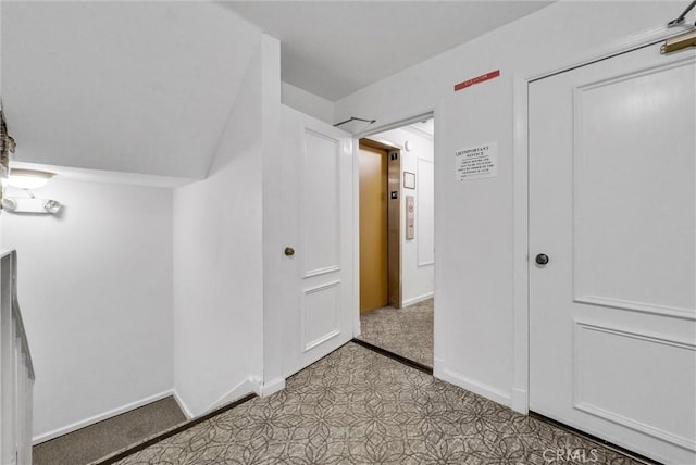 interior space with baseboards