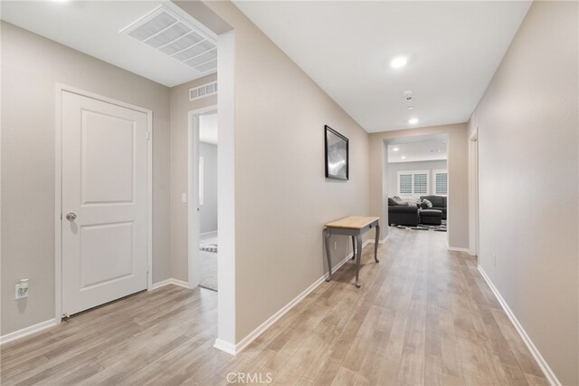 hallway featuring light wood-type flooring