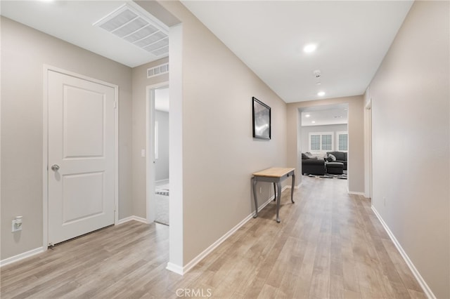 hall featuring light hardwood / wood-style flooring