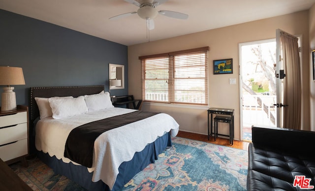 bedroom featuring hardwood / wood-style flooring and ceiling fan