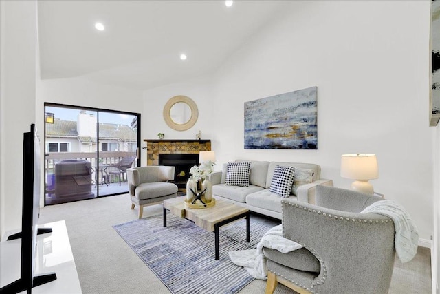 living room with light colored carpet and high vaulted ceiling