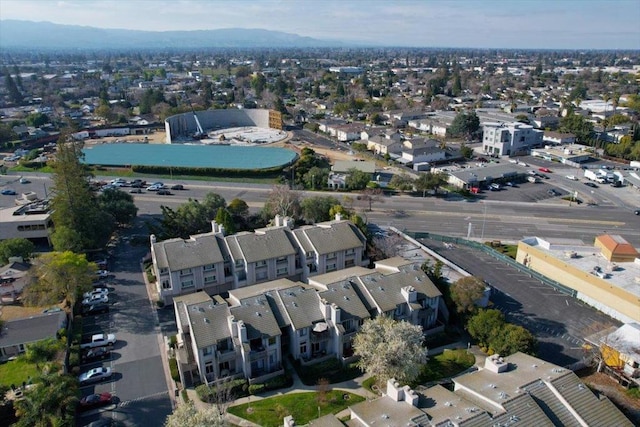 birds eye view of property featuring a mountain view