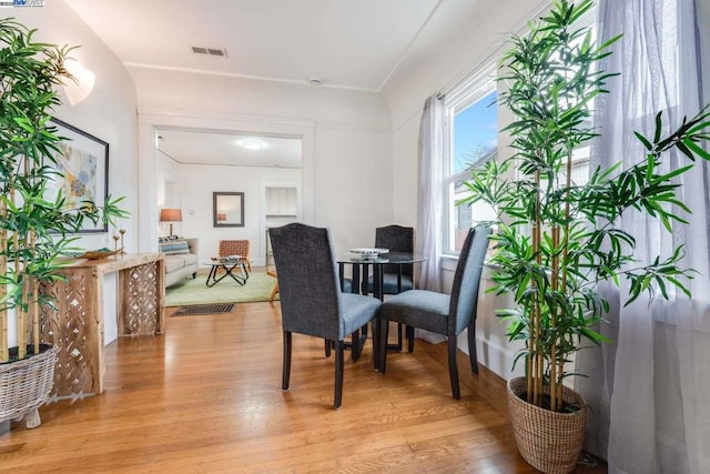 dining space featuring light hardwood / wood-style flooring