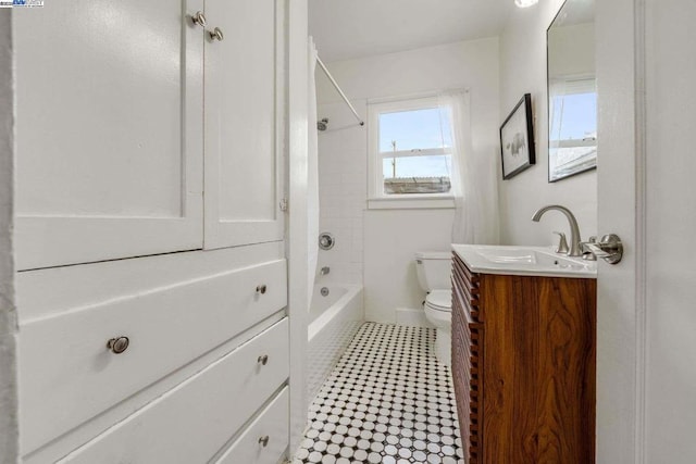 full bathroom featuring vanity,  shower combination, and toilet