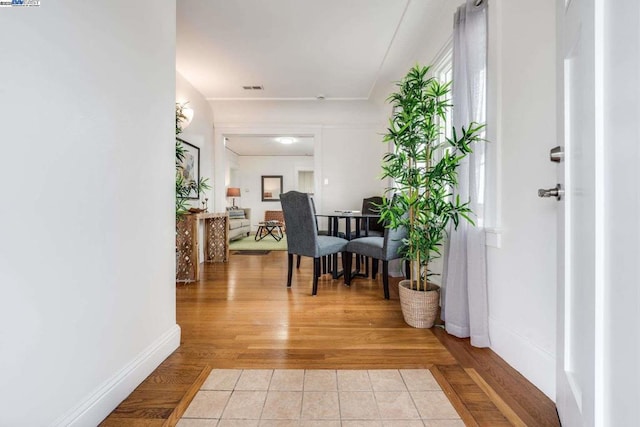 hall featuring light hardwood / wood-style floors