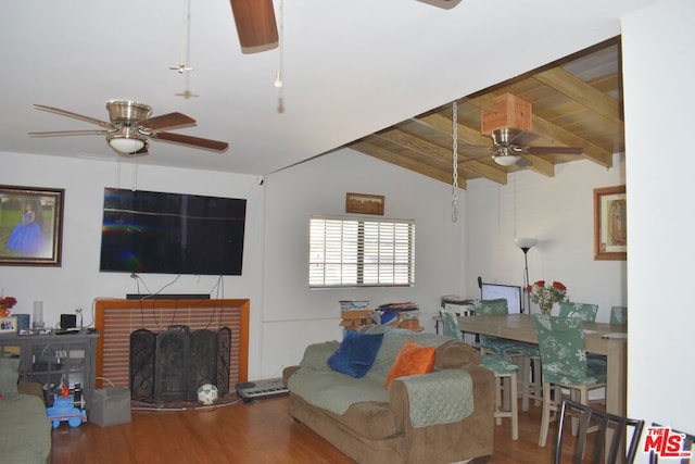 living room featuring a fireplace, lofted ceiling with beams, wood-type flooring, ceiling fan, and wood ceiling