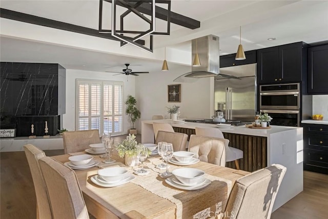 dining room featuring ceiling fan and light hardwood / wood-style flooring