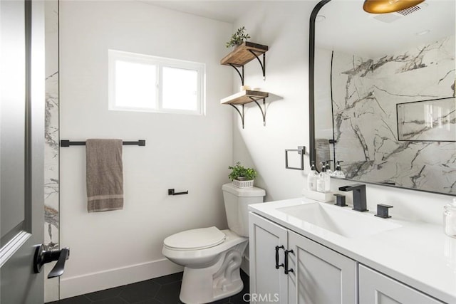 bathroom with vanity, walk in shower, tile patterned floors, and toilet