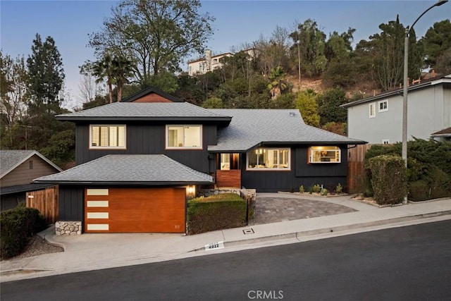 view of front of property with a garage