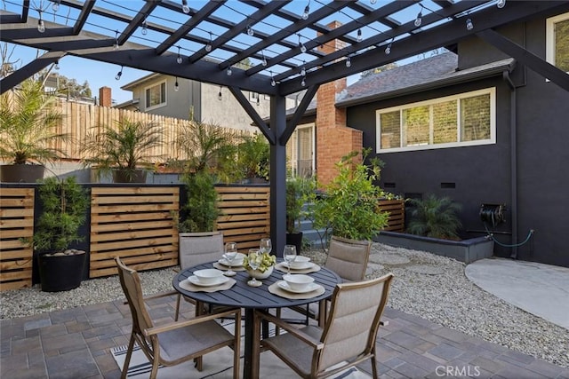 view of patio featuring a pergola