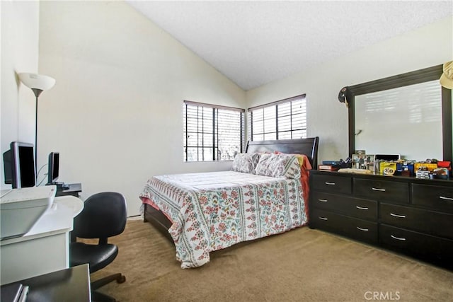 bedroom with lofted ceiling and light carpet