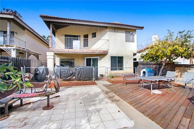 back of house featuring a patio area