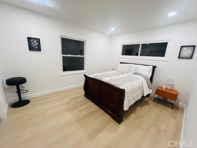 bedroom featuring light wood-type flooring