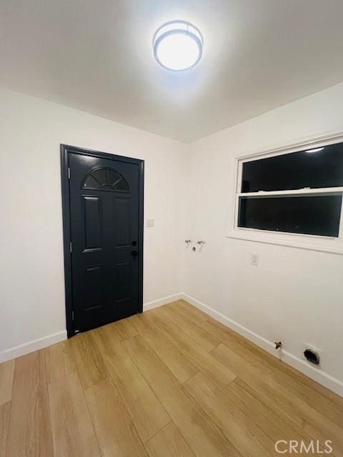 entrance foyer with hardwood / wood-style floors