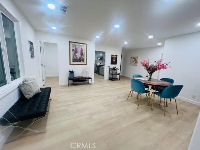 dining area featuring light hardwood / wood-style floors