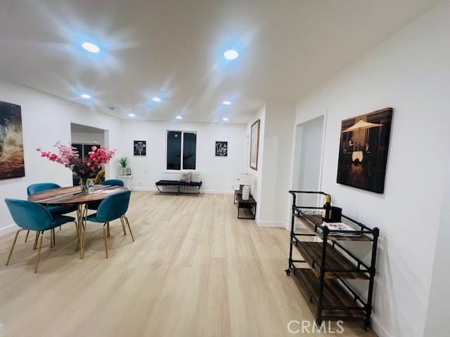 dining room featuring light hardwood / wood-style flooring