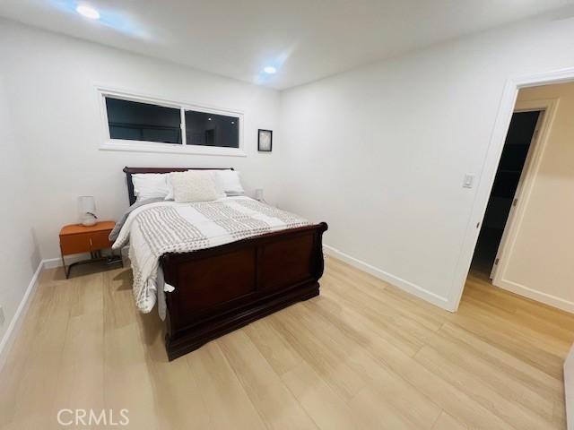 bedroom featuring light hardwood / wood-style floors