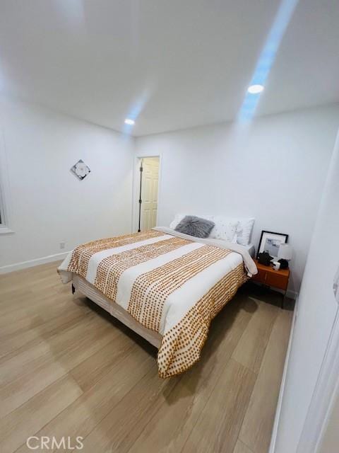 bedroom featuring light hardwood / wood-style flooring