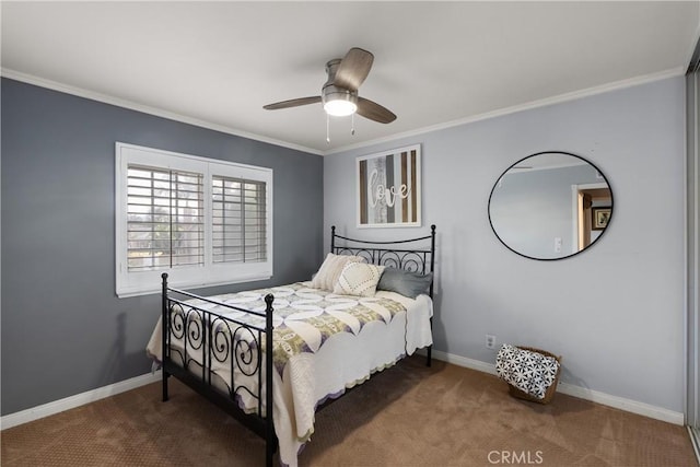 bedroom featuring crown molding, carpet flooring, and ceiling fan