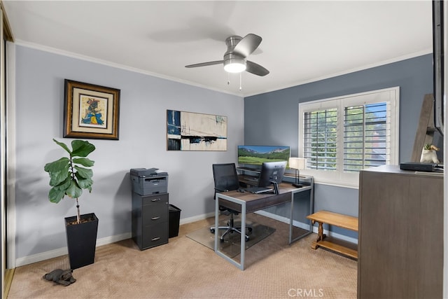 office featuring crown molding, light colored carpet, and ceiling fan