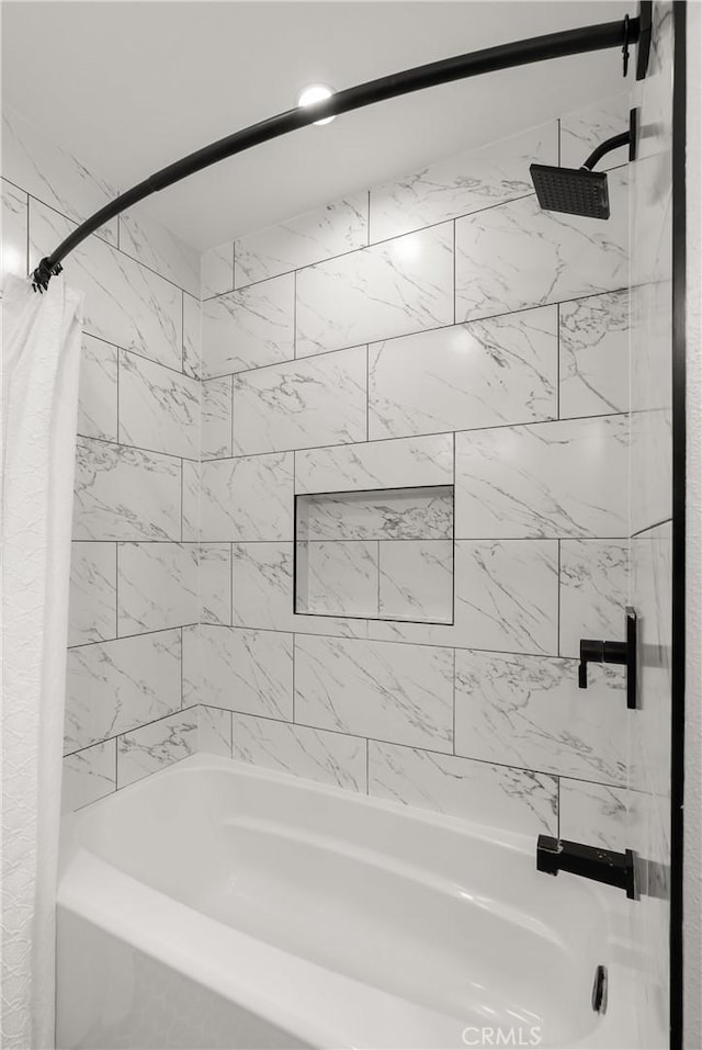 bathroom featuring shower / bath combo