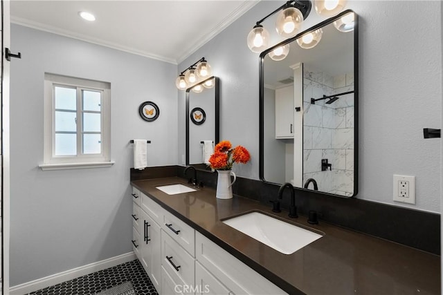 bathroom featuring vanity and crown molding