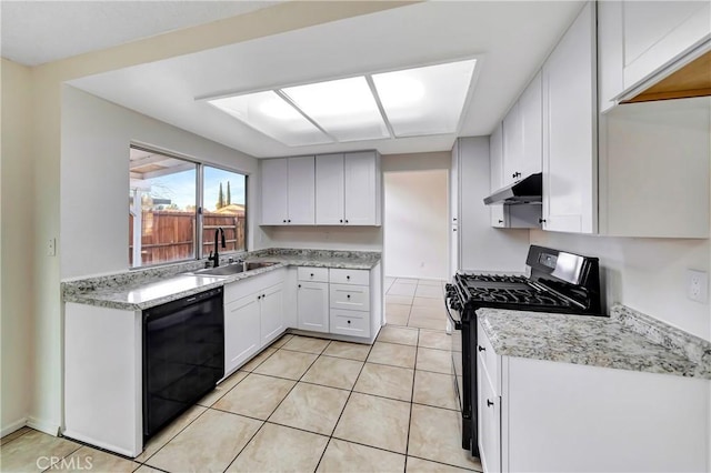 kitchen with light tile patterned flooring, white cabinets, sink, and black appliances