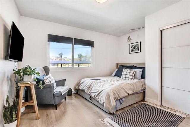 bedroom featuring light hardwood / wood-style floors