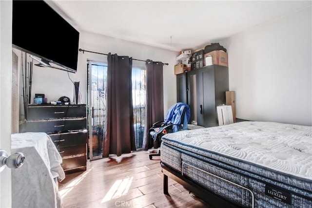 bedroom featuring hardwood / wood-style flooring