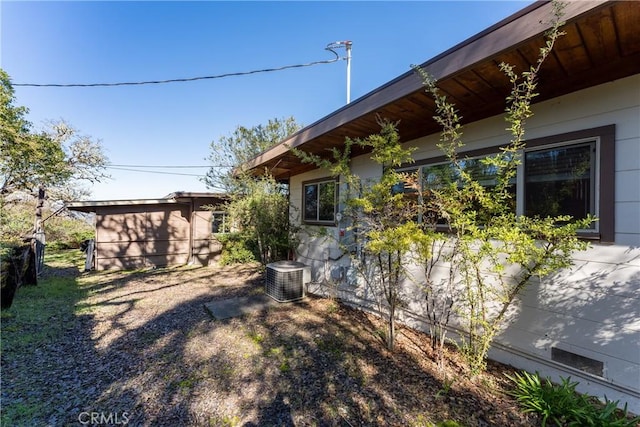 view of yard with central AC