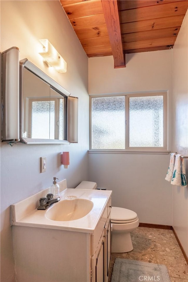 bathroom with plenty of natural light, vanity, and wooden ceiling