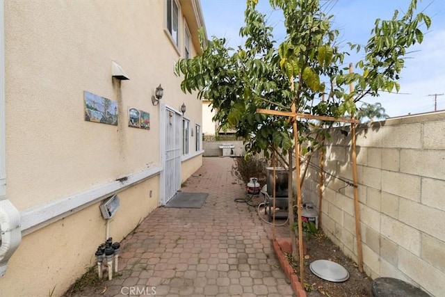 view of home's exterior with a patio