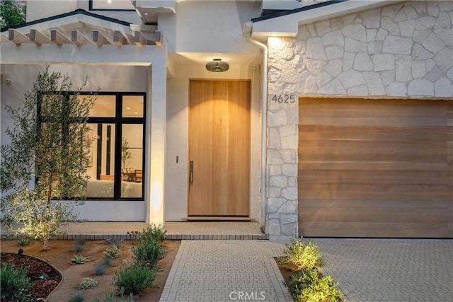 entrance to property with a garage