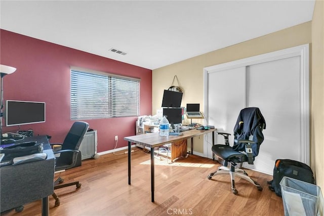 home office featuring light wood-type flooring