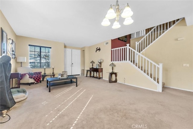 living room with carpet floors and a chandelier