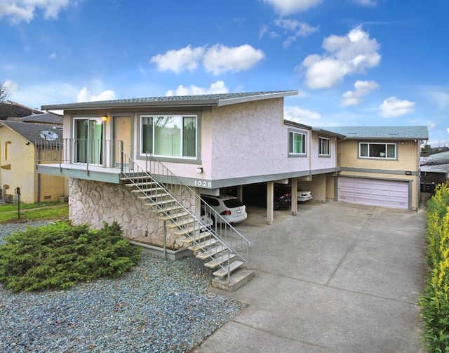 view of front of property featuring a garage