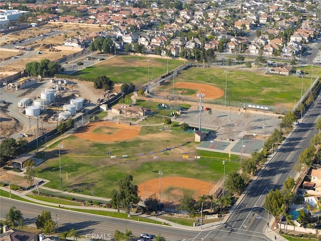 bird's eye view featuring view of golf course and a residential view